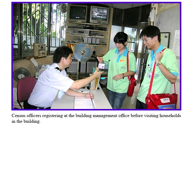 Census officers registering at the building management office before visiting households in the building.
