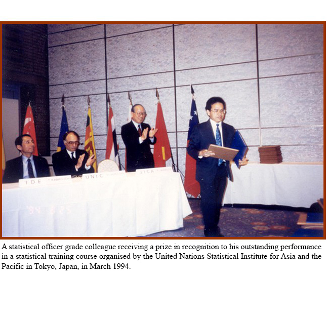 A statistical officer grade colleague receiving a prize in recognition to his outstanding performance in a statistical training course organised by the United Nations Statistical Institute for Asia and the Pacific in Tokyo, Japan, in March 1994.