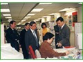 Mr Joseph W P Wong (third from left), Secretary for the Civil Service, visiting the Department in February 2001.