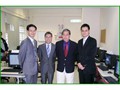 Mr H W Fung, Commissioner (second from left), with Professor Paul Cheung, Director of the United Nations Statistics Division (second from right), during his visit to the Department in June 2006.
